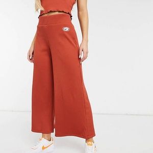 nike ribbed high waist wide leg sweatpants in rust